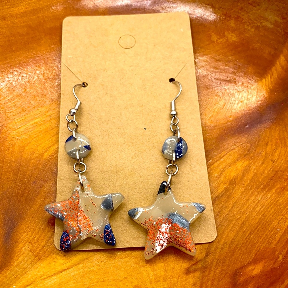 Blue and white with red glitter polymer clay earrings